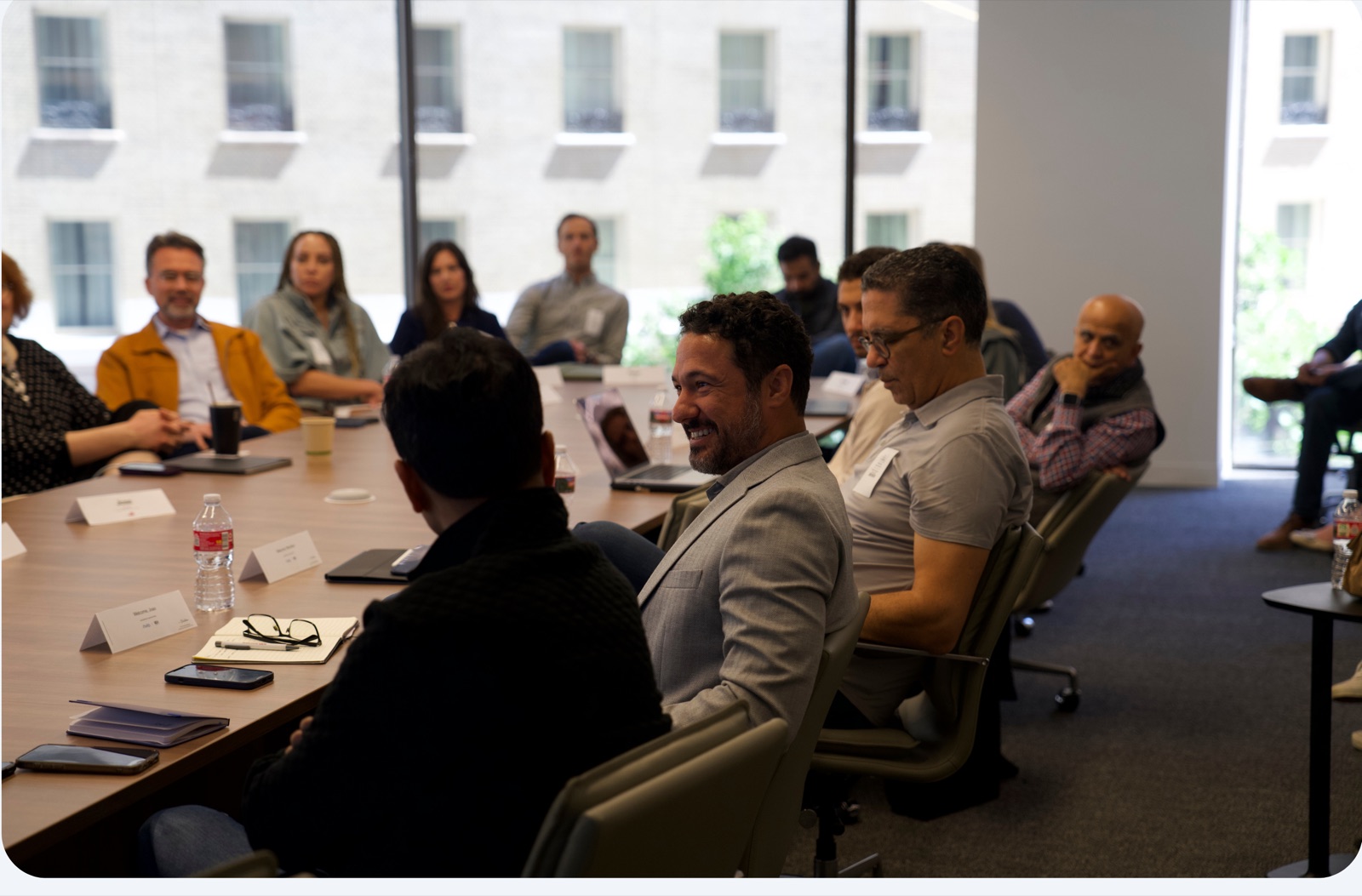 Workshop attendees exchanging ideas during a Rivio session