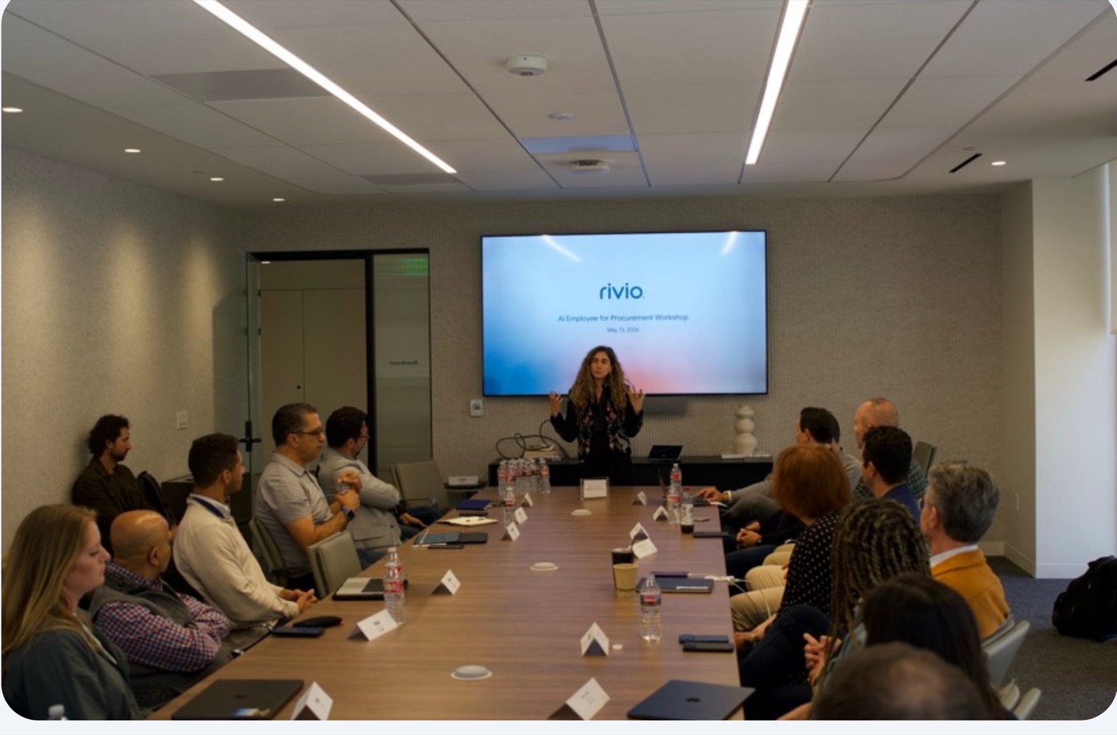 A full room participating in the AI Employee for Procurement workshop