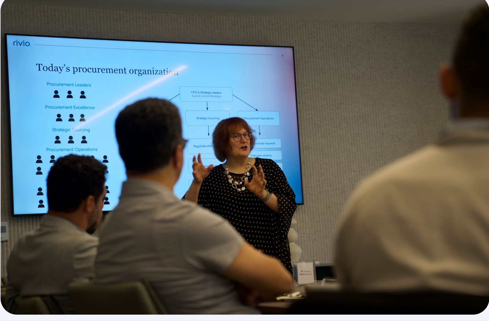 A procurement leader sharing practical perspectives with workshop attendees